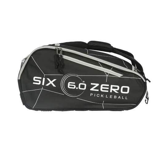 Six Zero Pro Tour Bag designed for pickleball, featuring a durable black exterior with logo and zip compartments.