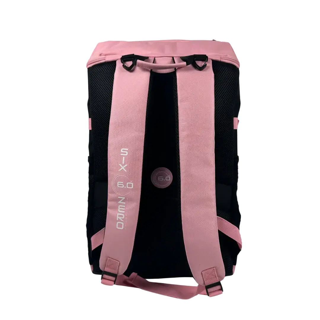 Six Zero Performance Backpack in pink and black, designed for pickleball and travel, showing durable straps.