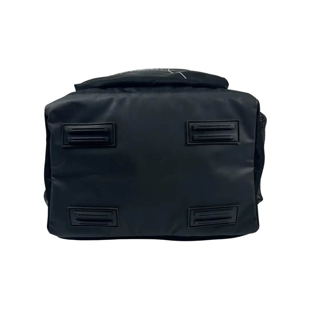 Back view of the Six Zero Performance Backpack showing durable base and sturdy construction for pickleball and travel.