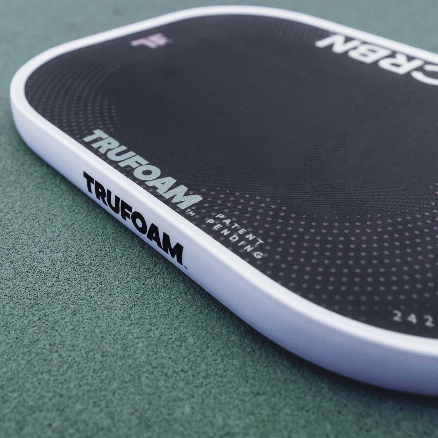 Close-up of CRBN TruFoam™ Genesis paddle showcasing its advanced foam core technology.