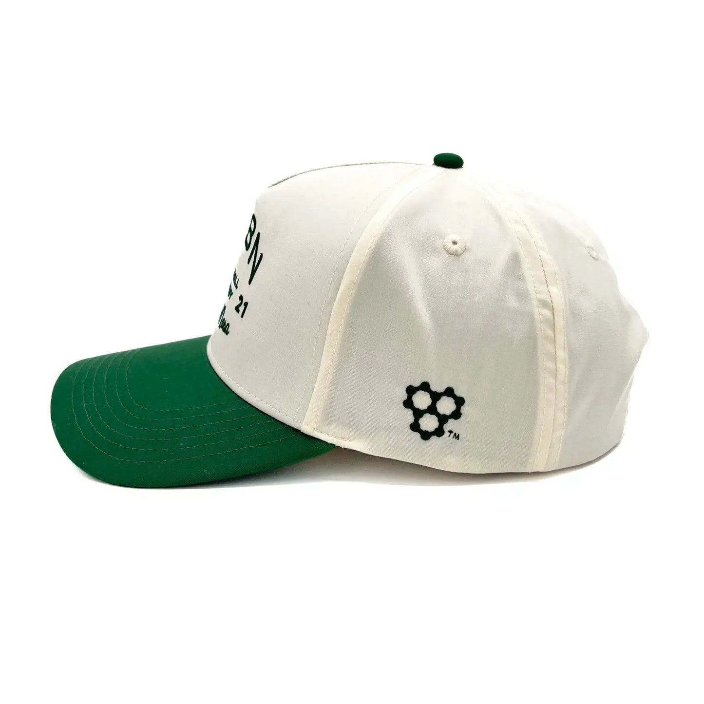 CRBN Heritage Snapback hat featuring classic cream and green colorway with stylish craftsmanship.