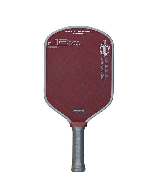 SWORD & SHIELD J2K+ paddle in red color, made of 100% aramid fiber and DuPont™ Kevlar®, designed for power and control.