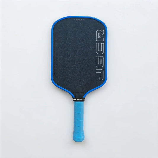 Honolulu J6CR Crystal Blue Endurance Surface™ paddle showcasing its sleek design and advanced technology.