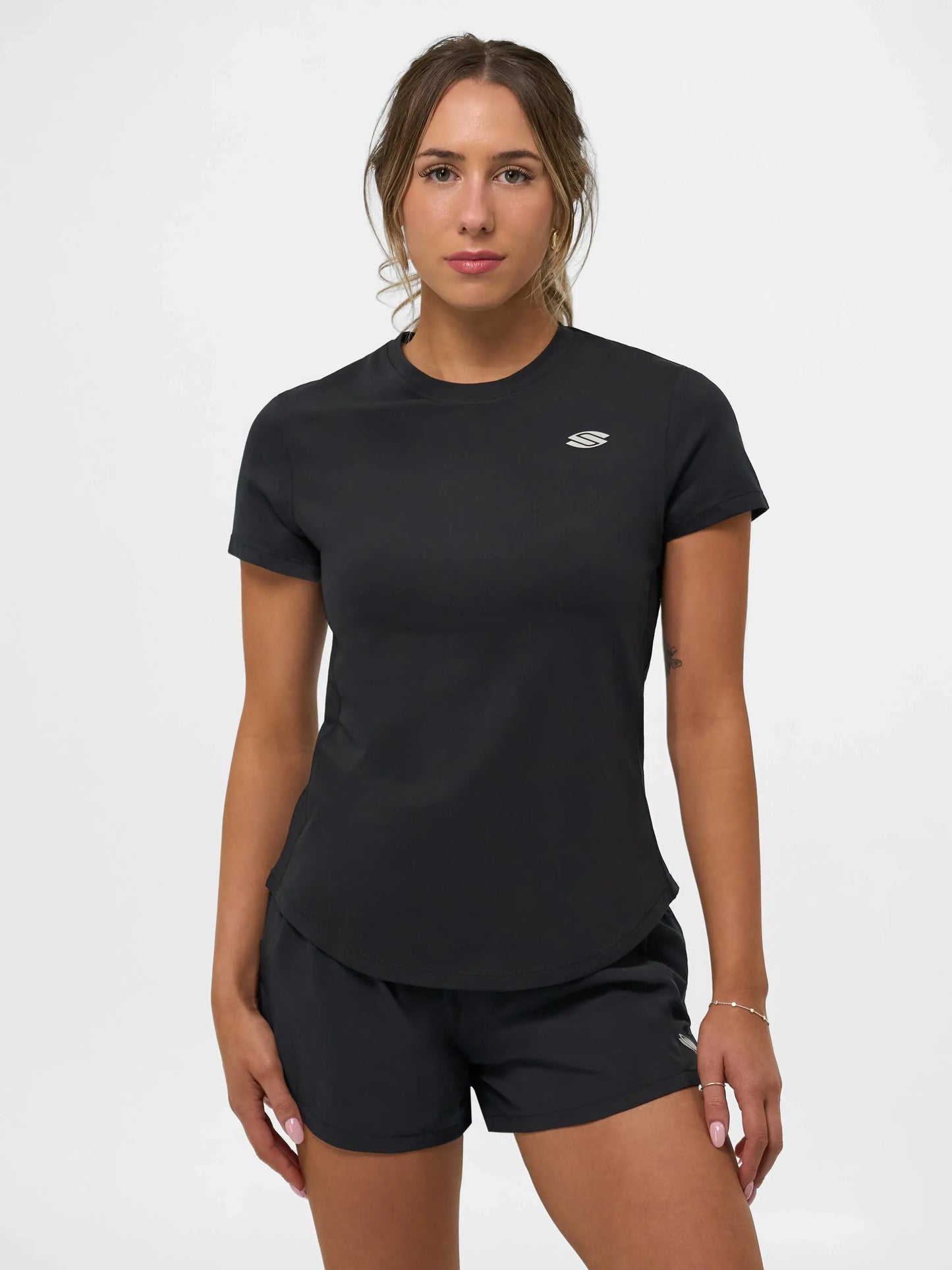 Selkirk Sport Women's Pro Line Short Sleeve Training Tee in black, featuring a relaxed fit and sporty design.