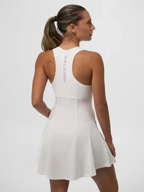 Selkirk Sport Women's Pro Line Pickleball Dress in white, showcasing back design and flared skirt for athletic comfort.