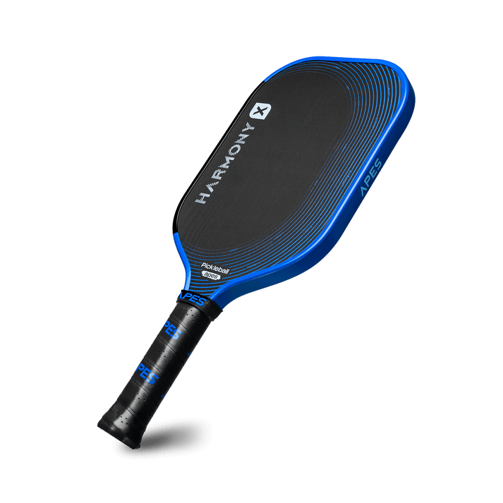 Pickleball Apes Harmony X paddle with honeycomb core, carbon fiber surface, and premium leather grip.