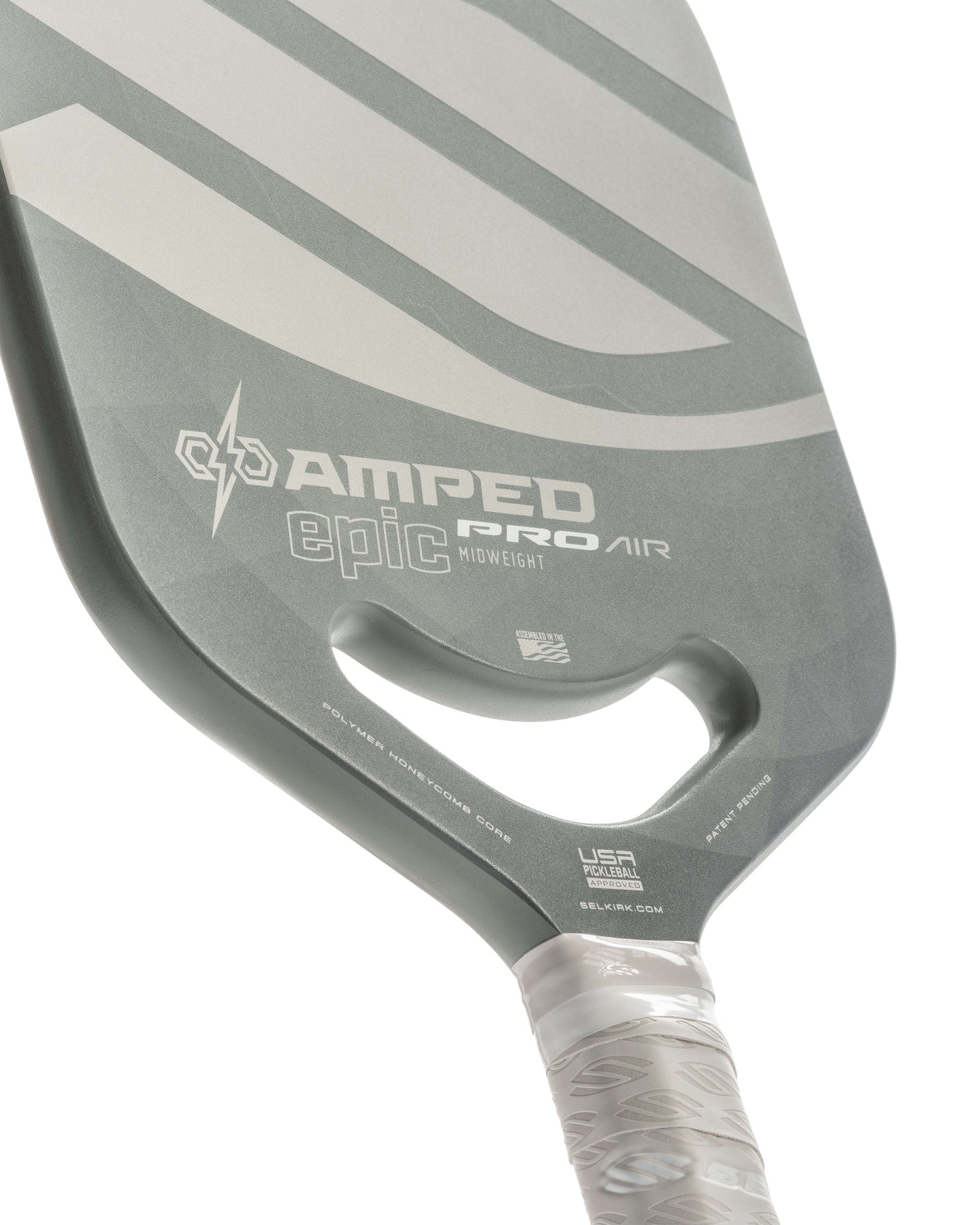 SELKIRK AMPED Pro Air pickleball paddle close-up, showcasing design and grip for balanced performance.