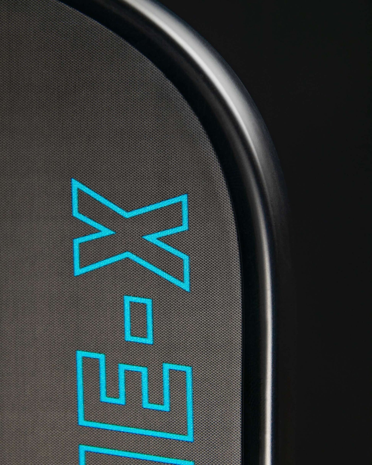 Close-up of the 11SIX24 Hurache-X Control+ paddle edge showcasing its innovative design and surface technology.