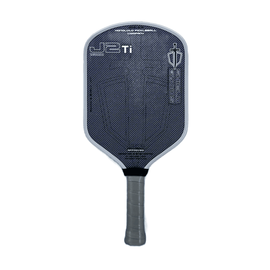 Honolulu Sword & Shield J2Ti paddle in blue and gold, designed for power, spin, and control with hybrid shape.