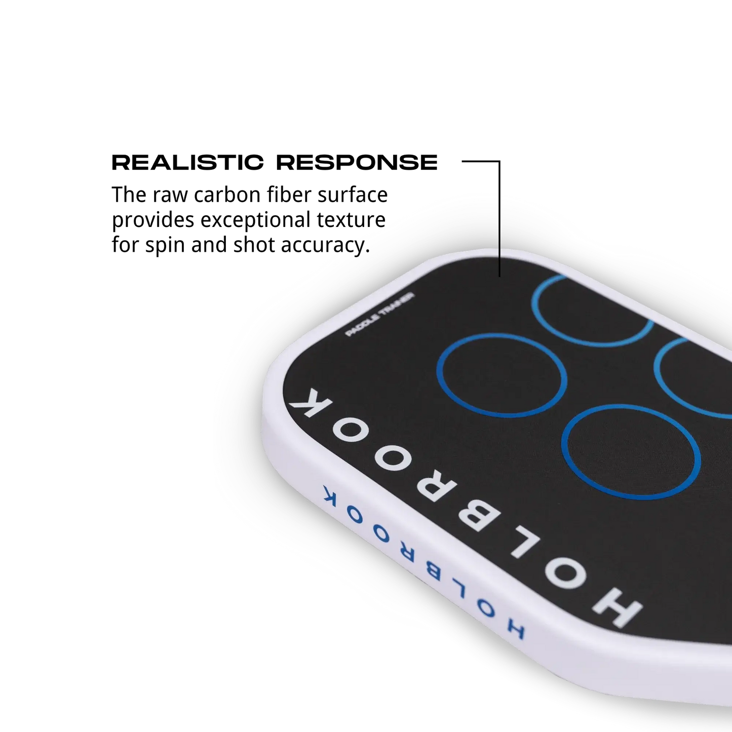 Holbrook Paddle Trainer showcasing T700 raw carbon fiber surface for enhanced power, precision, and spin control.