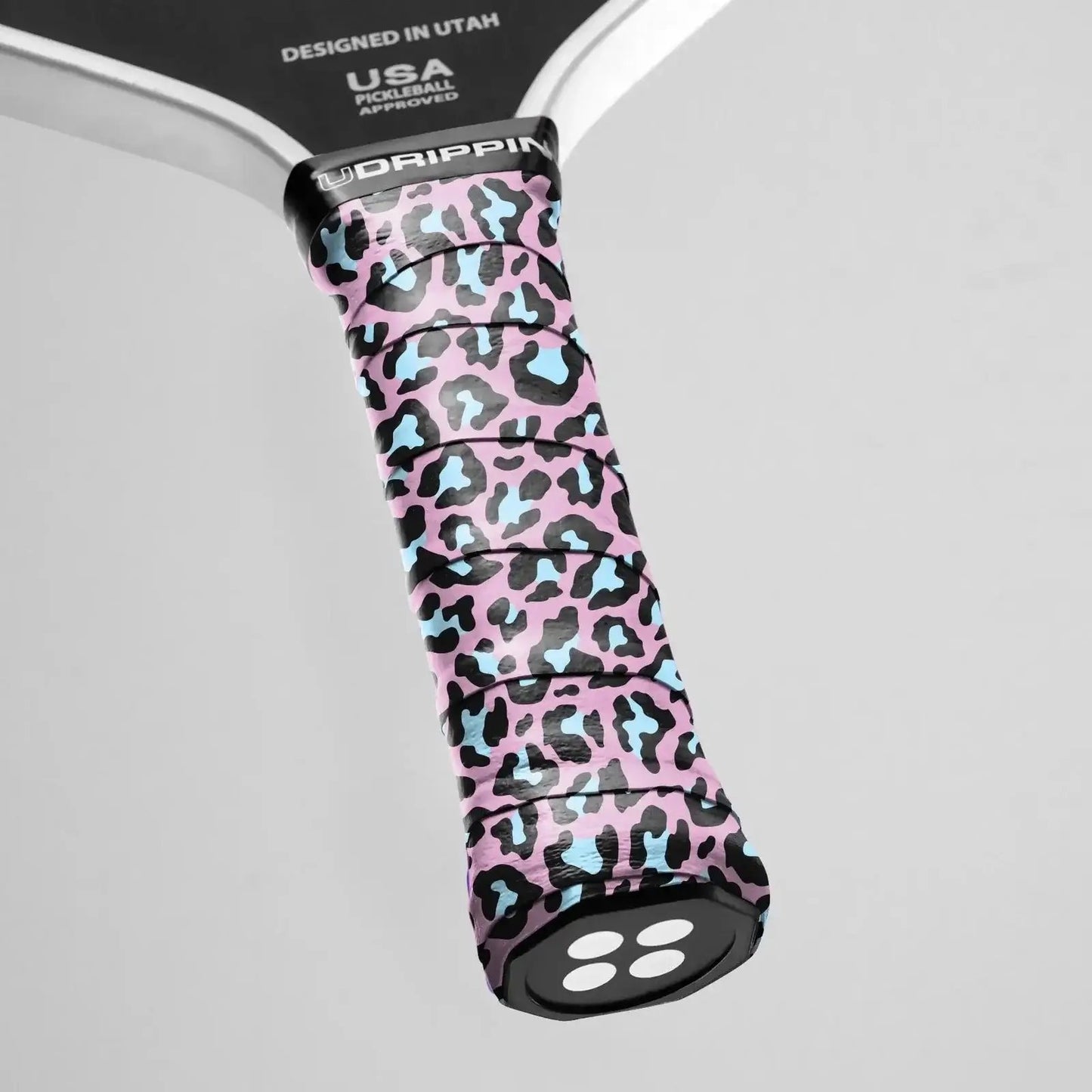 Udrippin Pink Leopard Print - Custom Grips with bold pink and blue leopard pattern on a paddle.