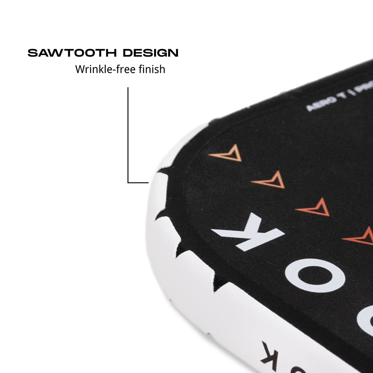 Close-up of Holbrook protective edge tape showing sawtooth design and wrinkle-free finish for pickleball paddle.
