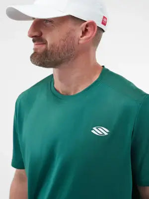 Man wearing a green short sleeve performance tee with moisture-wicking fabric, ideal for sports and activewear.