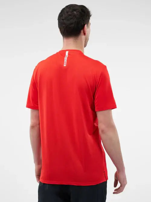 Men's red short sleeve performance tee with relaxed fit, showcasing quick-dry and moisture-wicking material.