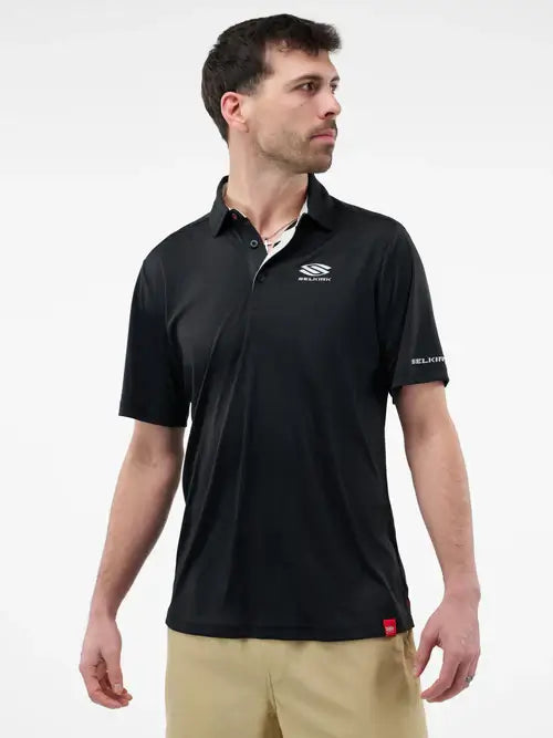 Men's Essentials Sport-Wik Short Sleeve Polo in black, featuring a relaxed fit and 4-way stretch fabric for performance.