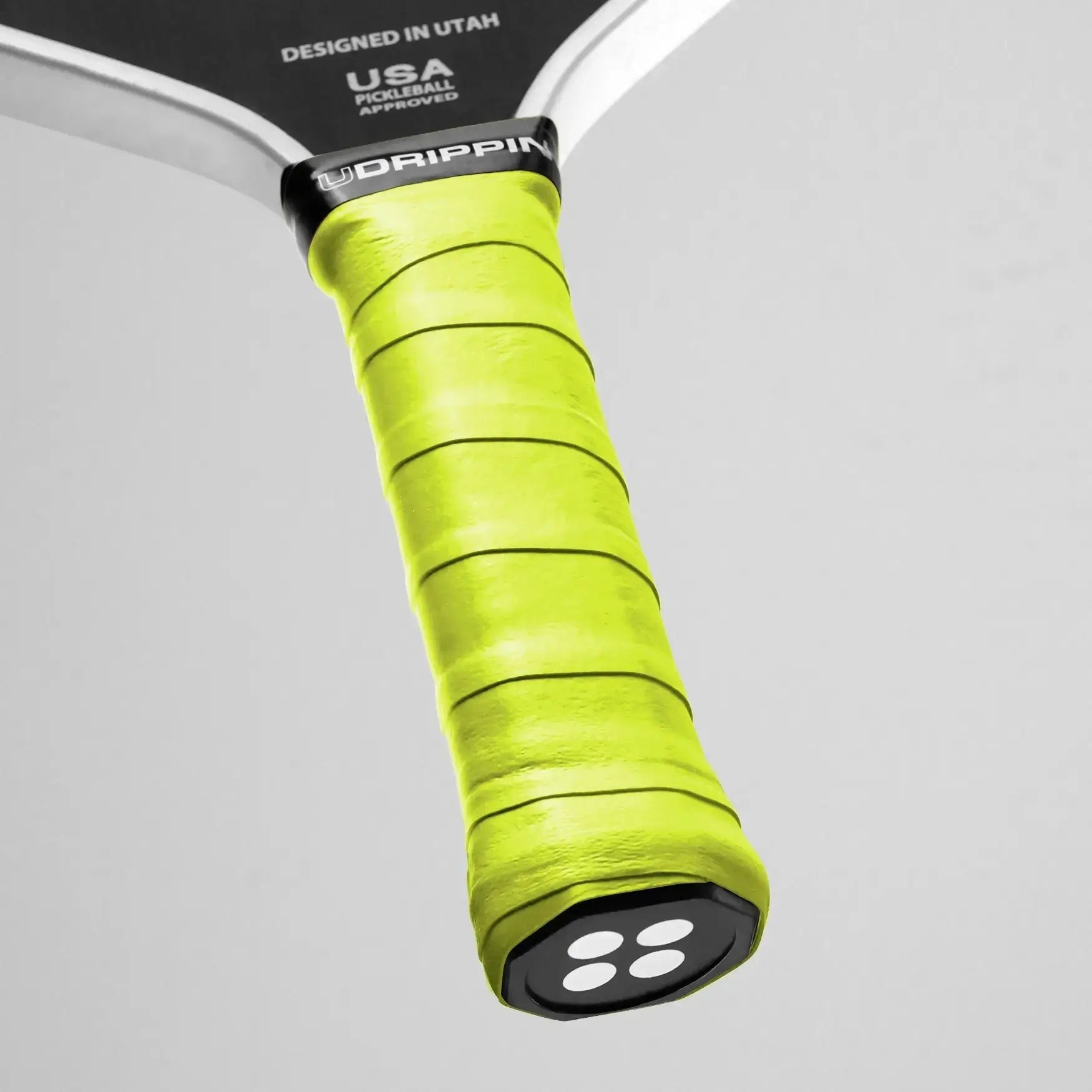 UDRIPPIN Comfort Tour Grip in vibrant yellow, designed for optimal comfort and sweat absorption during play.