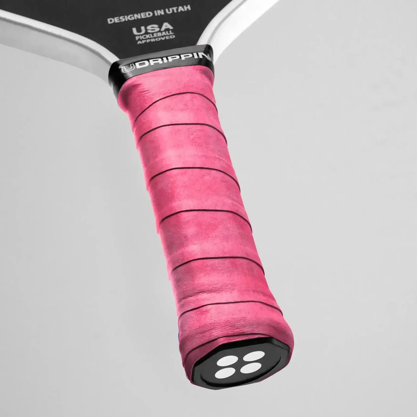 Close-up of Udrippin Pro Dry Grip in pink color showcasing 58mm thickness and premium wet absorbing material for comfort on court.