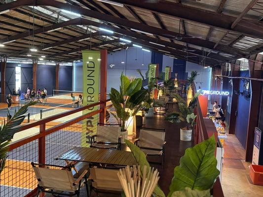 Indoor courts at Hyprground in Petaling Jaya featuring VIP lounges and view of playing area within the converted warehouse space.