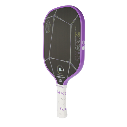 Six Zero Quartz pickleball paddle with purple edge guard and large sweet spot for enhanced control and power.