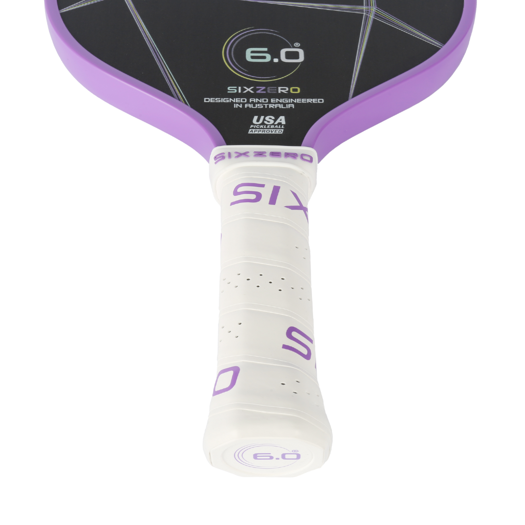 Six Zero Quartz pickleball paddle with purple edge and large sweet spot for amplified control, power and pop