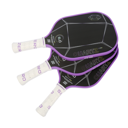 Six Zero Quartz pickleball paddles in purple with white handles, offering quality performance and affordability for players.