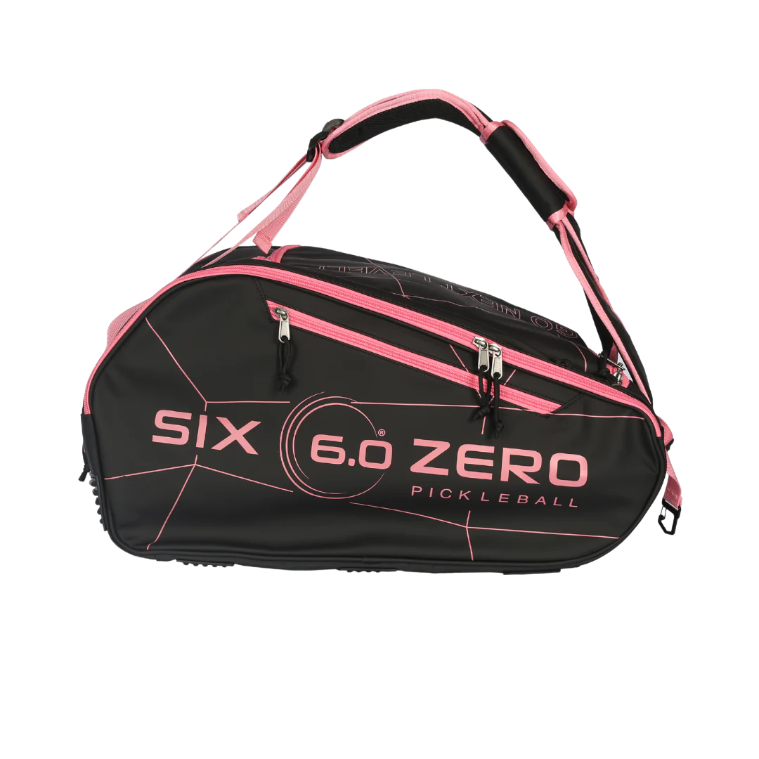 Six Zero Pro Tour Bag in black and pink, designed for pickleball players, featuring durable construction and user-friendly design.