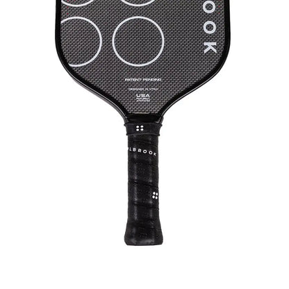 Holbrook ARMA paddle with textured grip and carbon fiber surface, available for pre-order with 15% off.