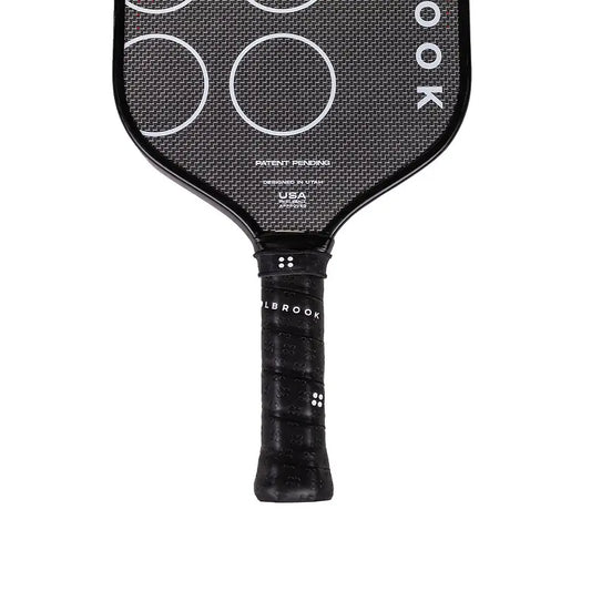 Holbrook ARMA paddle with textured grip and carbon fiber surface, available for pre-order with 15% off.