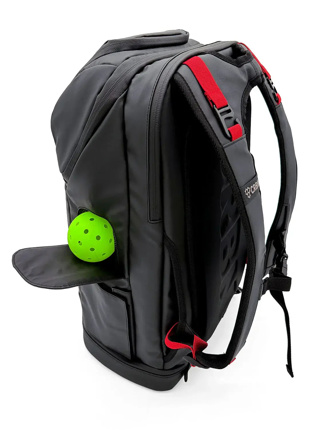 CRBN Pro Team Backpack 2.0 side view with ball garage and green pickleball.