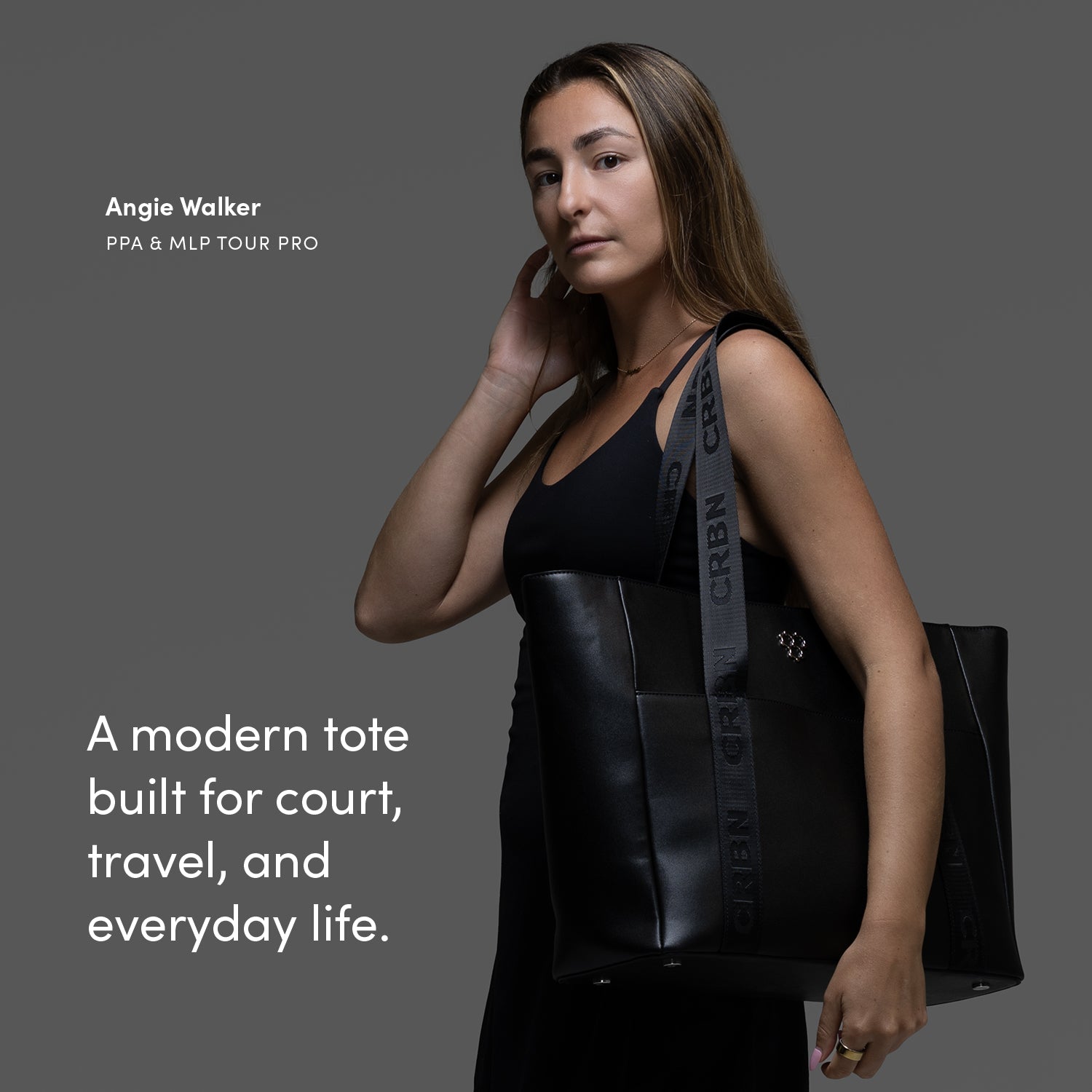 CRBN Club Pickleball Tote Bag [NEW] showcased by a player, emphasizing style and versatility for court and travel.