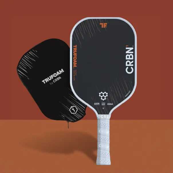 CRBN¹ TruFoam Barrage (Elongated, Long Handle) paddle with protective cover displayed on a brown background.