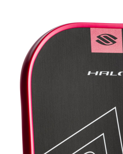 Close-up of SLK HALO Power pickleball paddle edge showcasing T700 carbon fiber and vibrant design.