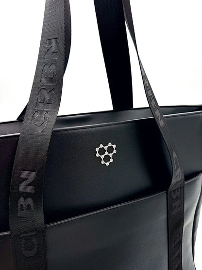 CRBN Club Pickleball Tote Bag [NEW] featuring a sleek design and stylish branding on premium Italian PU leather.