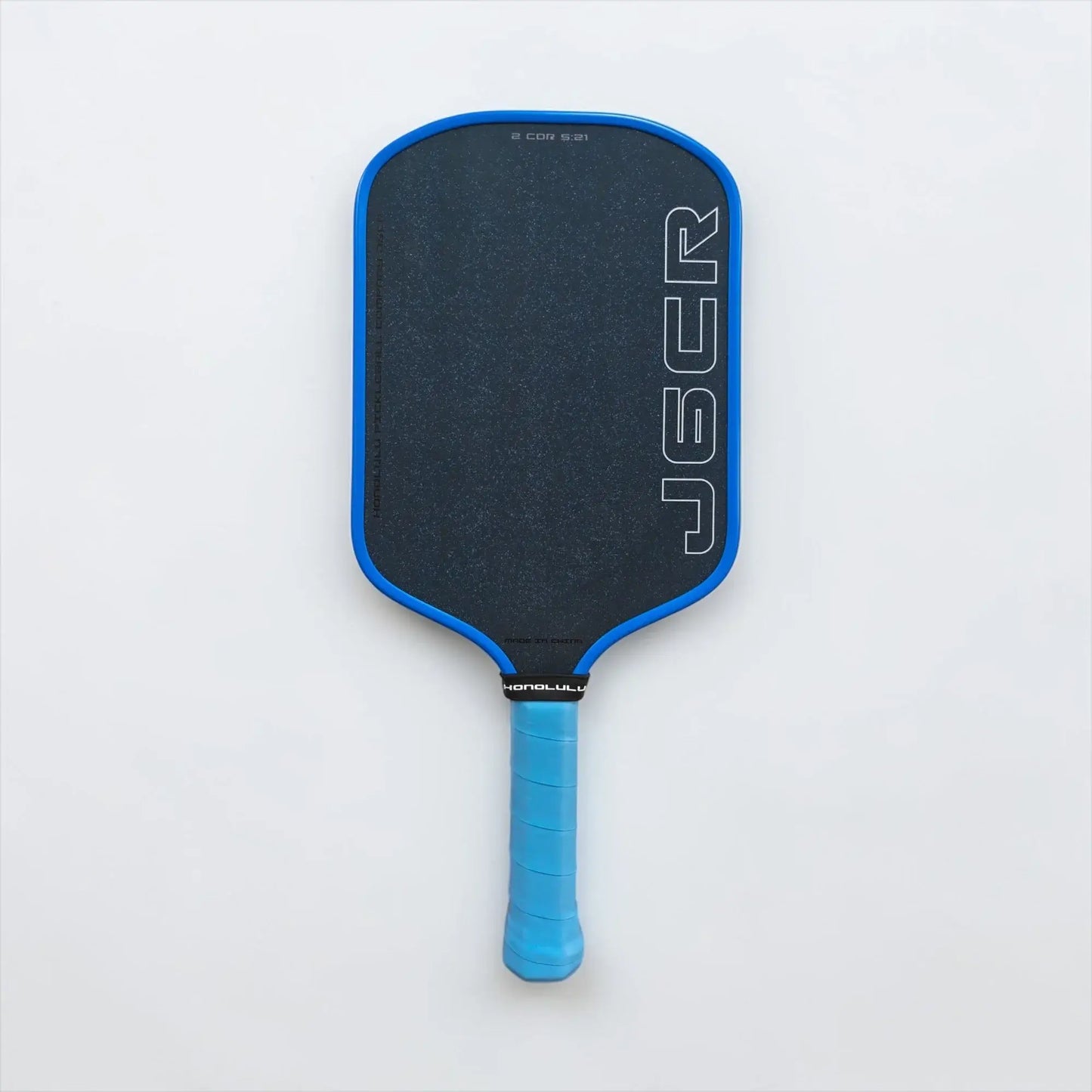 Honolulu J6CR Crystal Blue Endurance Surface™ paddle showcasing its sleek design and advanced technology.