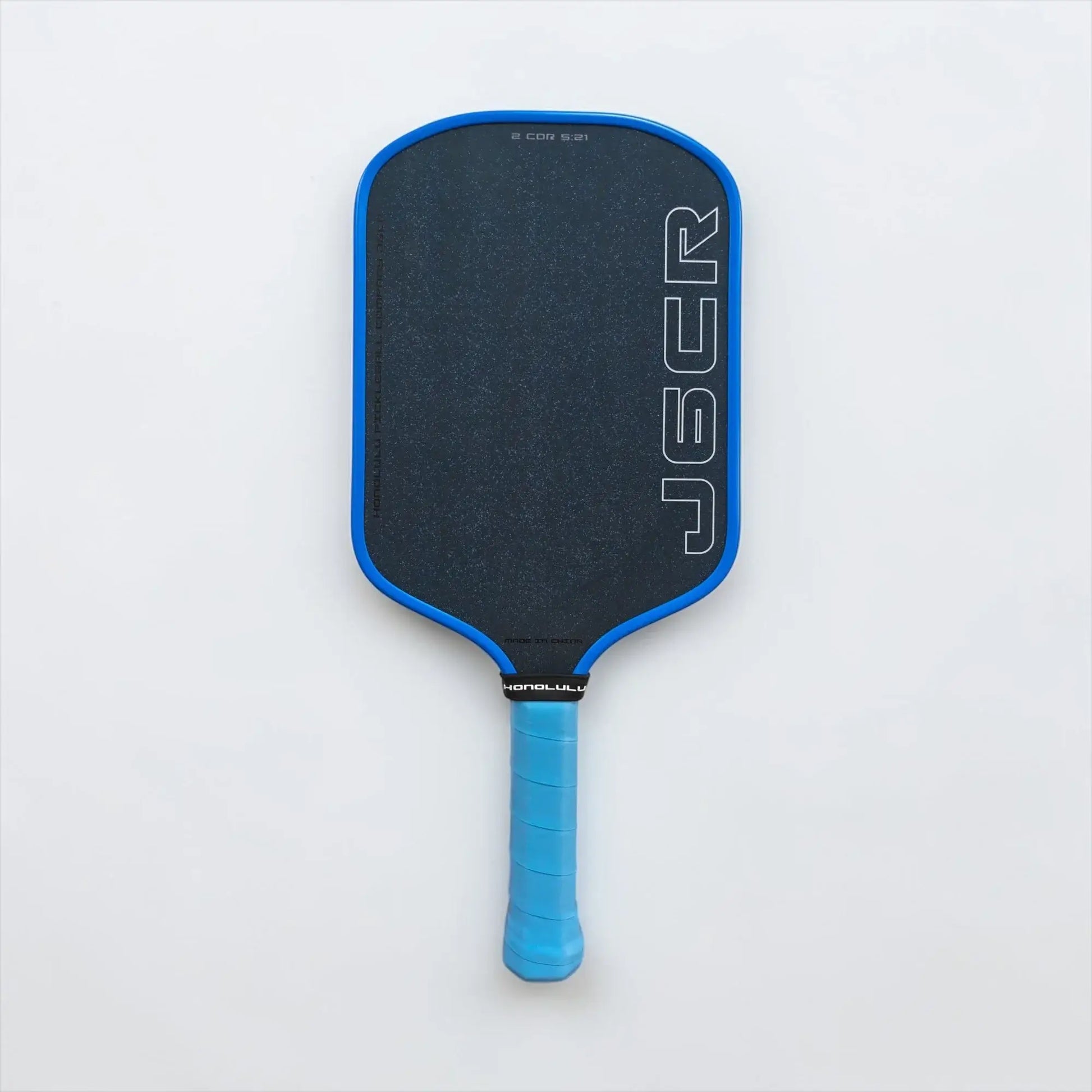 Honolulu J6CR Crystal Blue Endurance Surface™ paddle showcasing its sleek design and advanced technology.