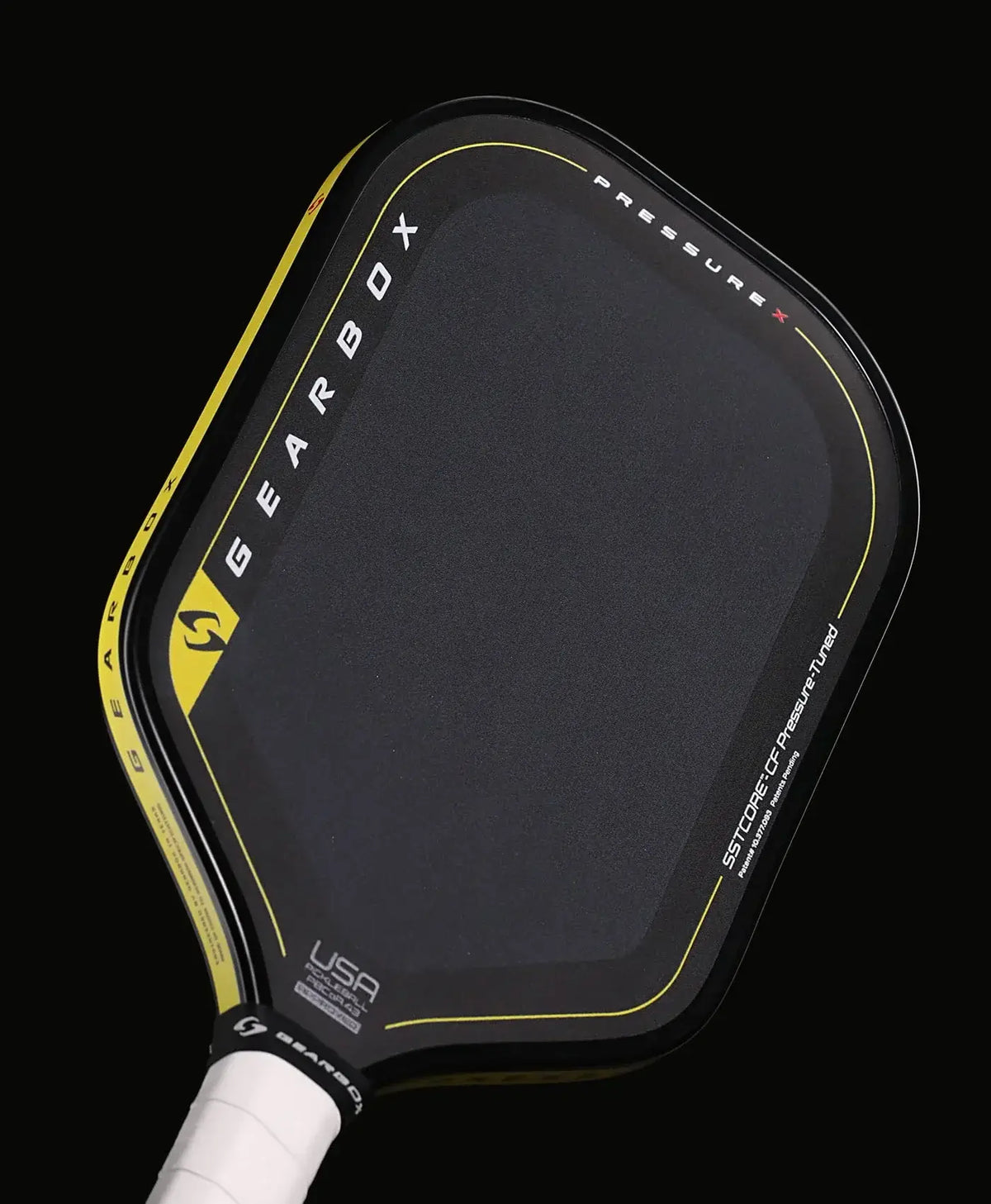 Gearbox Pressure X 8E Elongated paddle showing its surface and design features for powerful shot shaping.