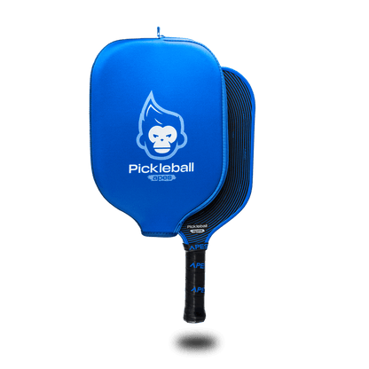 Pickleball Apes Harmony S paddle featuring blue cover, ergonomic grip, and honeycomb core for control and comfort.