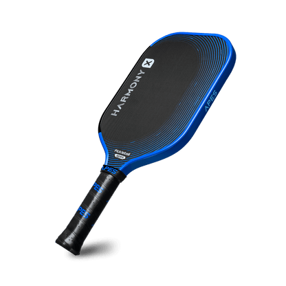 Pickleball Apes Harmony X paddle with honeycomb core, carbon fiber surface, and premium leather grip.