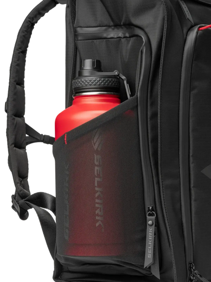 Selkirk Pro Line 2.0 Tour Pickleball Backpack (35L) with a water bottle in its side pocket.