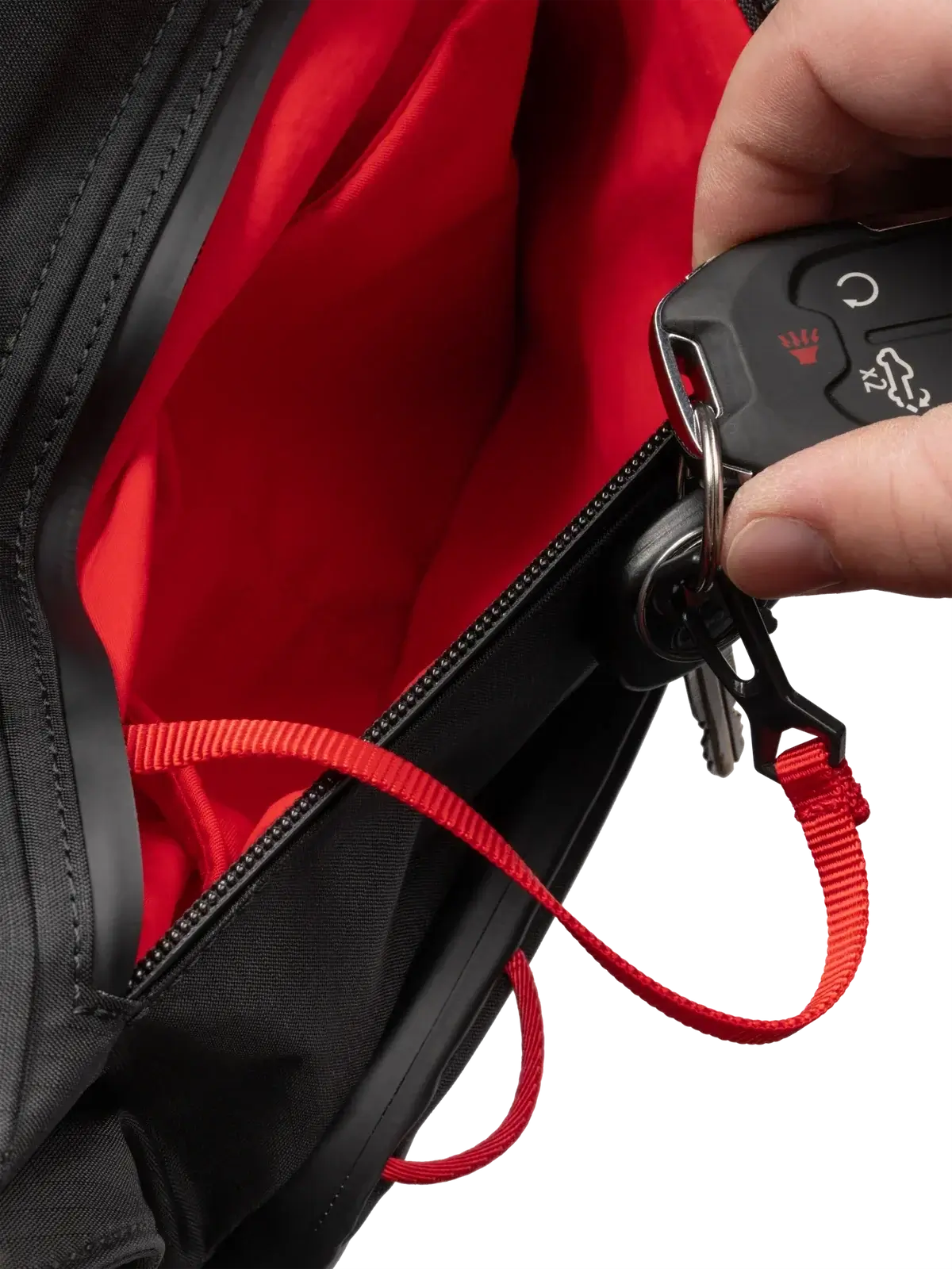 Selkirk Pro Line 2.0 Tour Pickleball Backpack (35L) interior pocket with red lining and key clip.