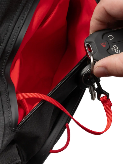 Selkirk Pro Line 2.0 Tour Pickleball Backpack (35L) interior pocket with red lining and key clip.