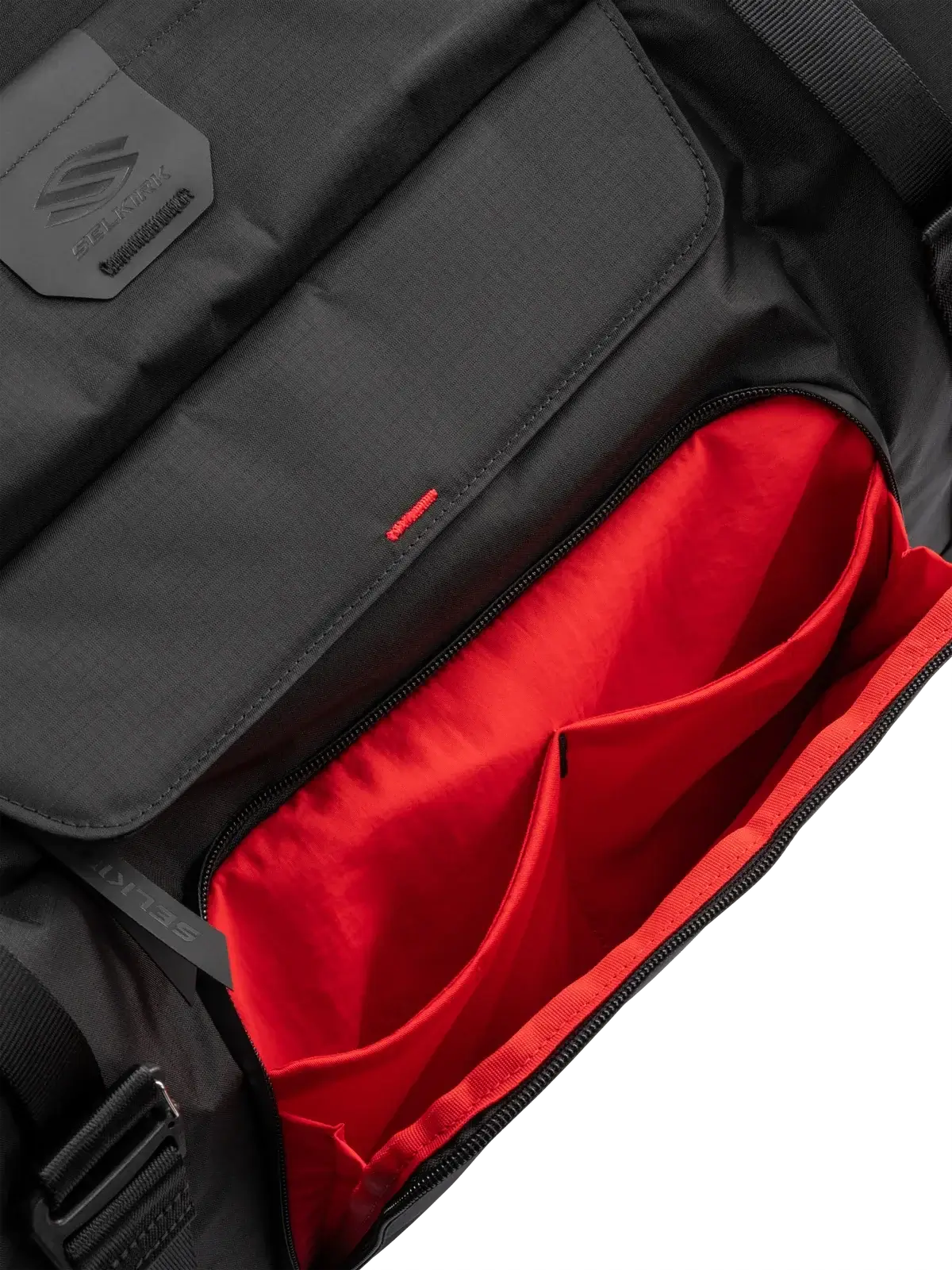 Interior view of the Selkirk Pro Line 2.0 Pickleball Duffle (45L) featuring organized compartments.