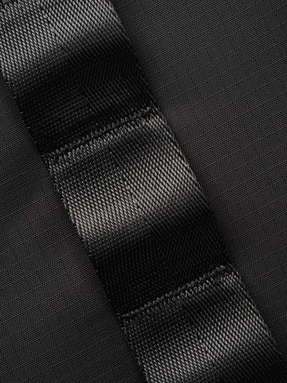 Close-up of the durable strap fabric used in the Selkirk Pro Line 2.0 Pickleball Duffle (45L) highlighting texture and quality.