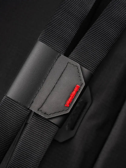 Close-up of the Selkirk Pro Line 2.0 Pickleball Duffle (45L) shoulder strap detail with red accent.