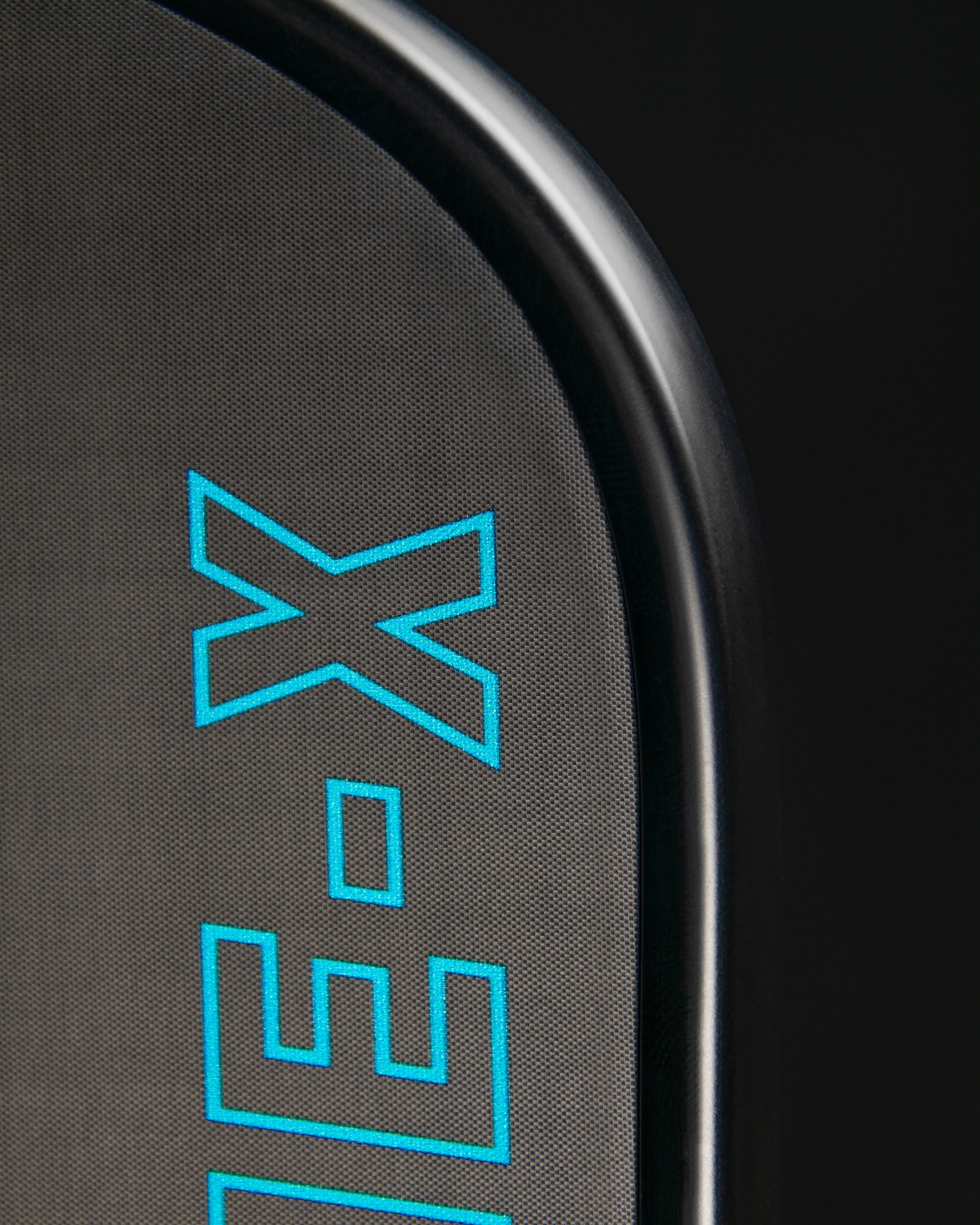 Close-up of 11SIX24 Hurache-X Control+ pickleball paddle showcasing its unique surface design.