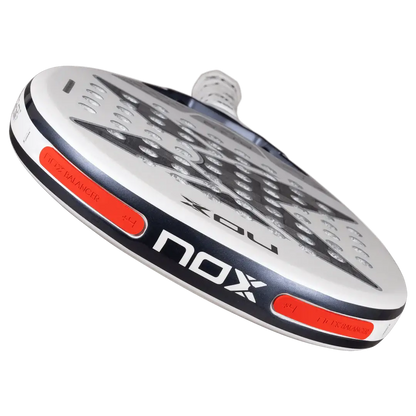 NOX AT10 LUXURY GENIUS 12K ALUM XTREM LITE 2026 BY AGUSTÍN TAPIA padel racket angled view showcasing design features.