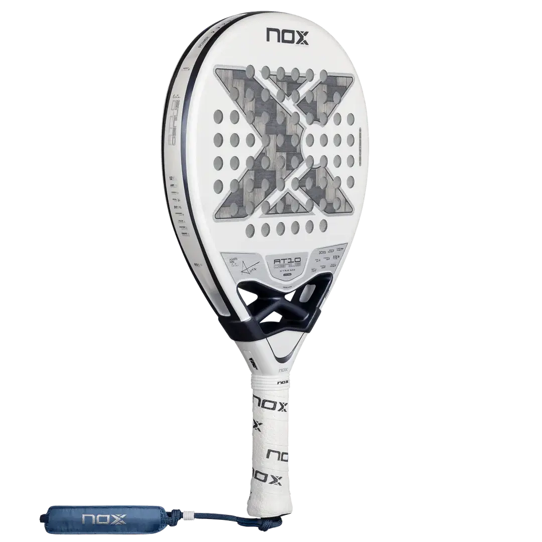 NOX AT10 LUXURY GENIUS 12K ALUM XTREM LITE 2026 BY AGUSTÍN TAPIA paddle racket with white and gray design.