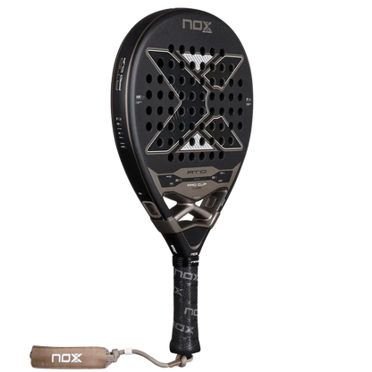 NOX AT10 PRO CUP HARD BY AGUSTÍN TAPIA paddle racket showcasing innovative design features and modern aesthetics.