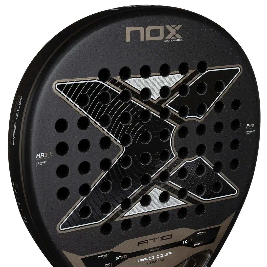 NOX AT10 PRO CUP HARD BY AGUSTÍN TAPIA paddle racket close-up showing design and perforations.