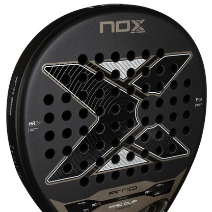 NOX AT10 PRO CUP HARD BY AGUSTÍN TAPIA paddle racket close-up showing design and perforations.